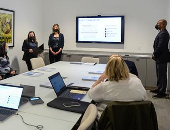 business students giving a presentation