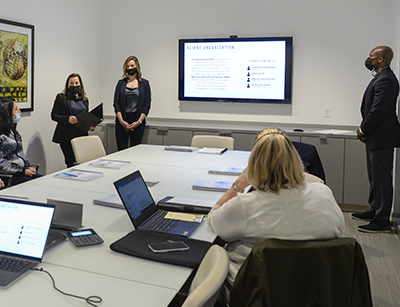 business students giving a presentation