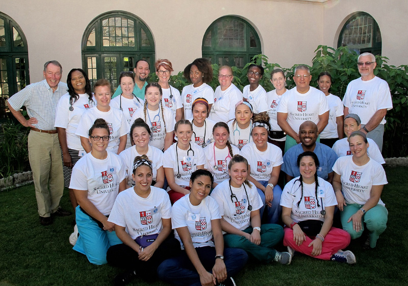 Group photo of Sacred Heart University nursing students and faculty on a medical mission trip in Jamaica