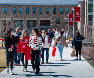 Students and families touring campus