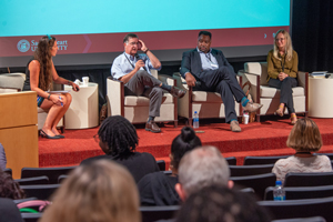 Panel of people talking to audience