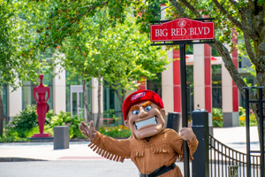 Big Red with Big Red Blvd street sign