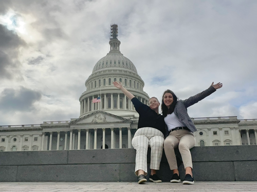 Two SHU students in front of Capitol Building
