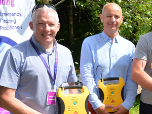 Leonard Mangan & Gary Delaney with AEDs