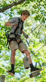 Student on ropes course
