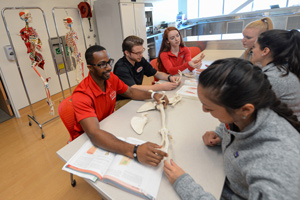 Students in PT lab with bones