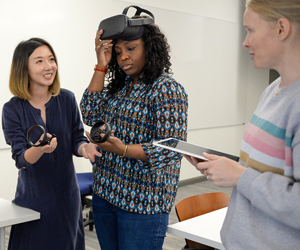 Professor and Students Using VR