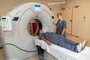 Students using MRI machine
