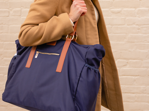 Woman holding tote bag