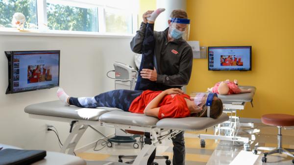 students working in an athletic training lab