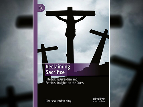 Book cover for Reclaiming Sacrifice showing three crosses