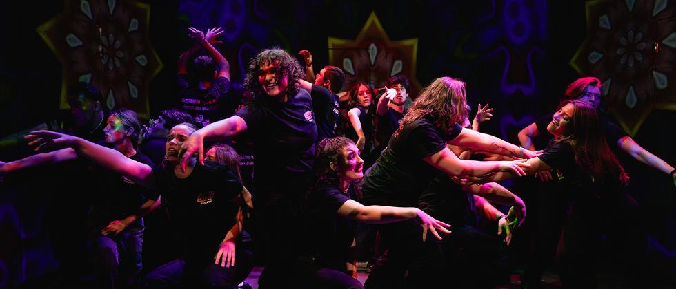 Students performing on stage