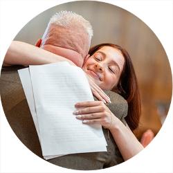 Renna Badolato hugging her father