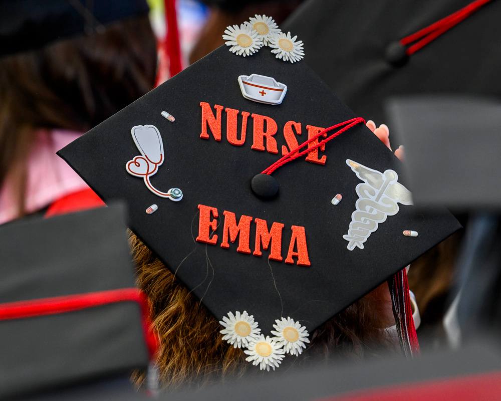 Graduation cap that says Nurse Emma