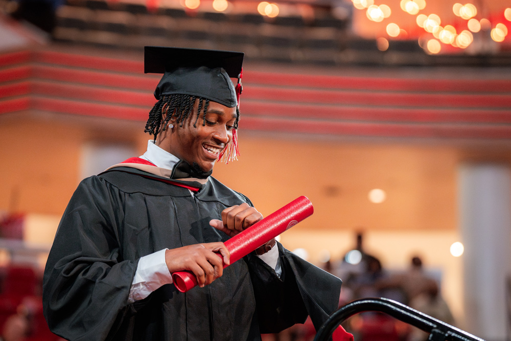 Graduate at Commencement