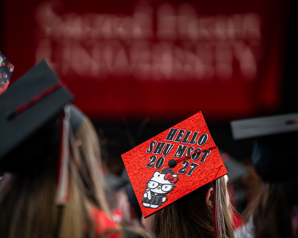 Graduation cap that says Hello SHU MSOT 2027