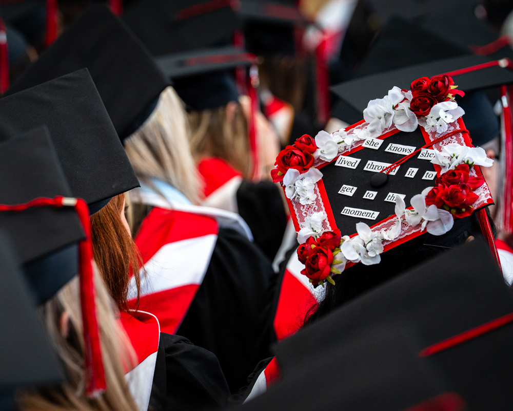 Graduation cap that says she knows she lived through it to get to the moment