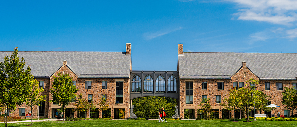 Students walking in Pioneer Village