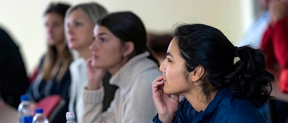 Students listening in a classroom