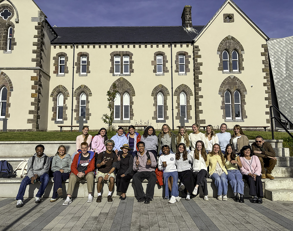 Nursing students and Deans outside of the SHU Dingle building