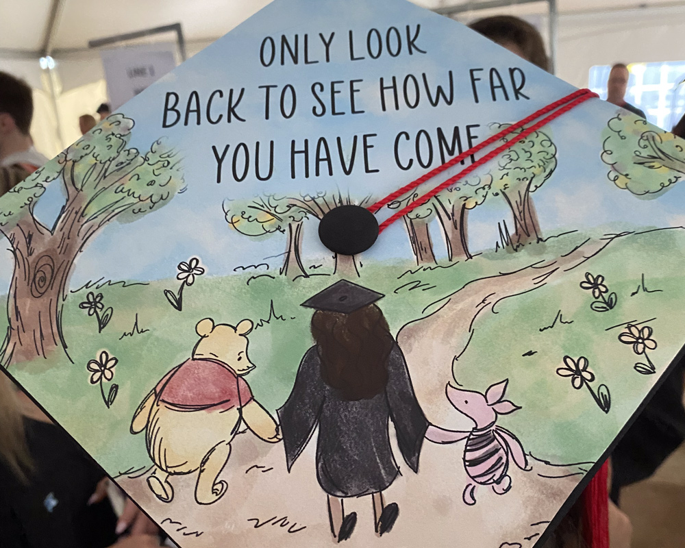 Graduation cap that says Only look back to see how far you have come