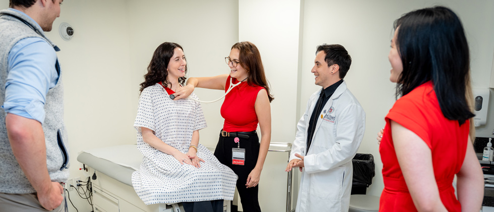 PA students in a hospital setting lab