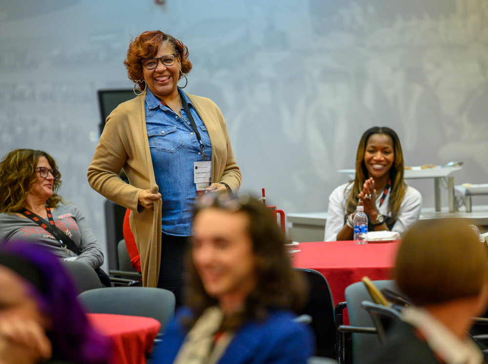 Conference attendees smiling