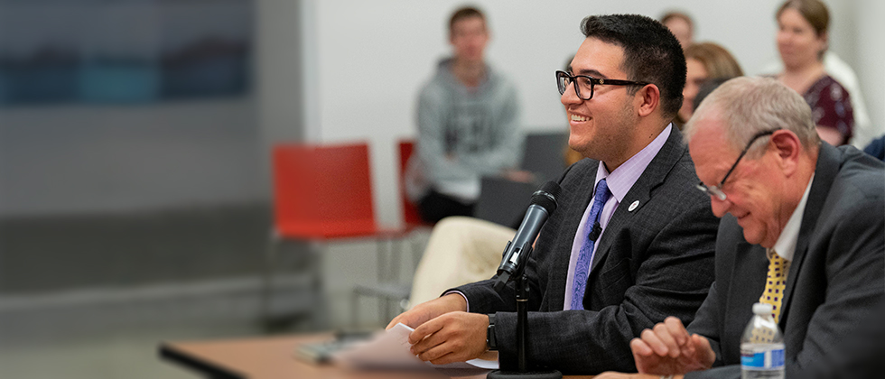 Smiling student in audience