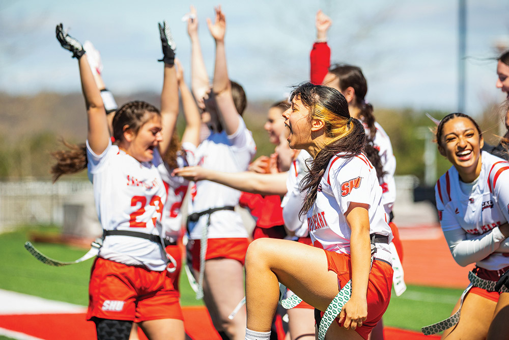 Team celebrates on the field