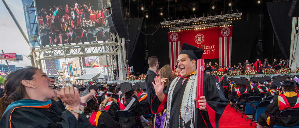 Excited graduate at Commencement