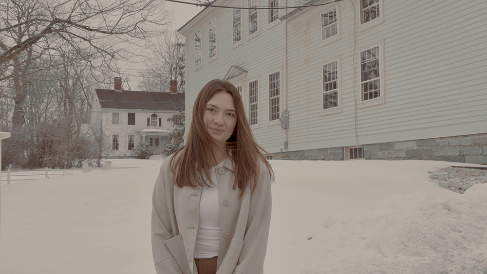 Alexandra Maxwell standing outside the museum