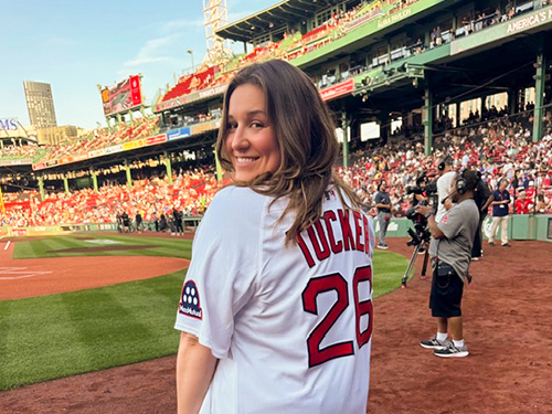 Maria Tucker on the field at the Red Sox stadium