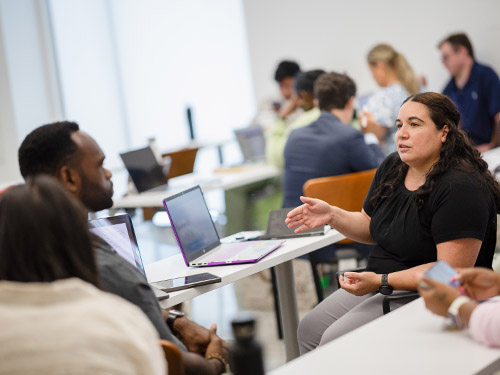 Educators talking in classroom