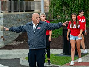 public safety officer directing traffic at a crosswalk
