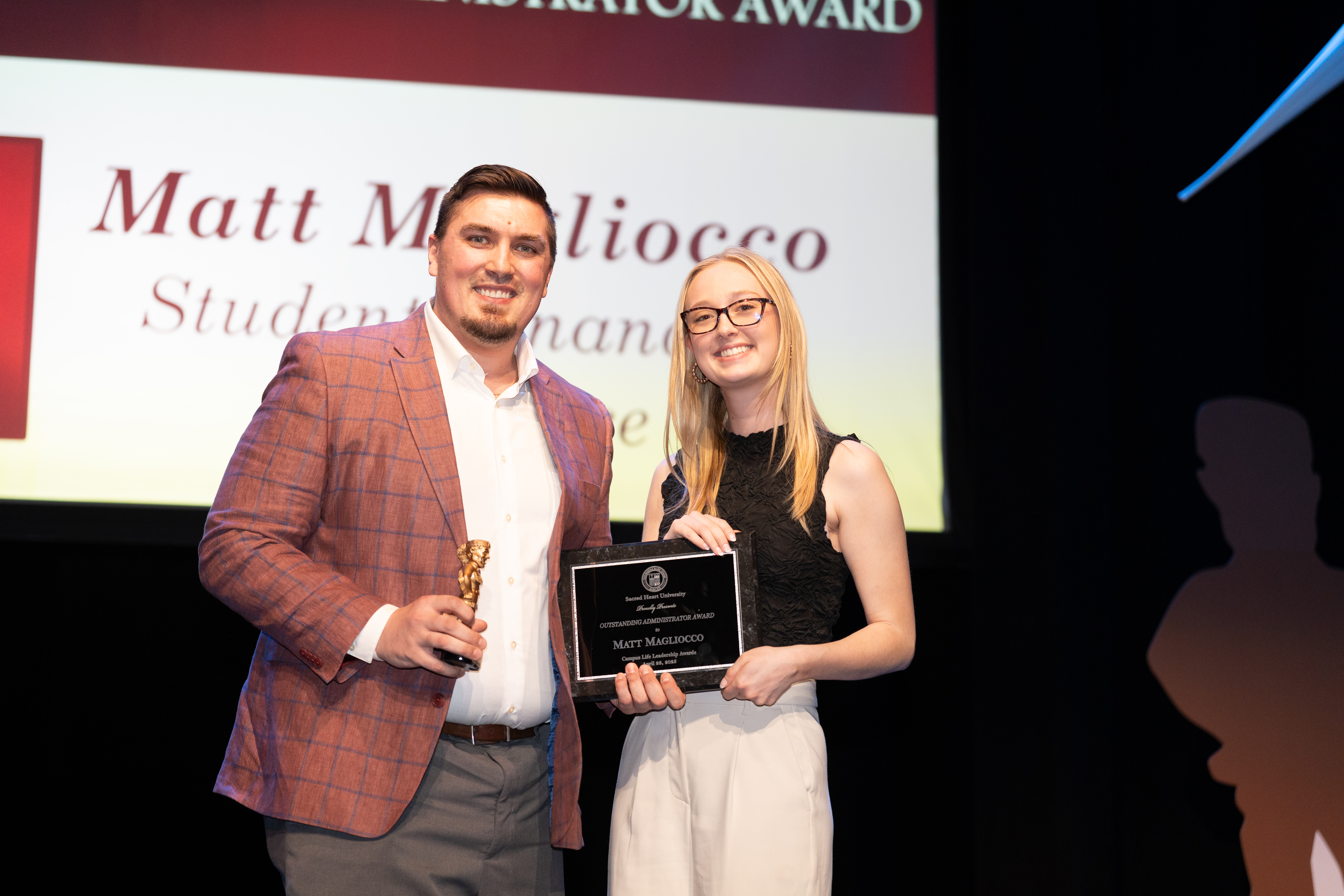 Staff member receiving award