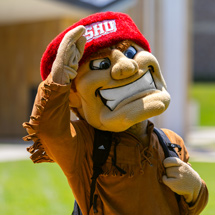 Big Red waving