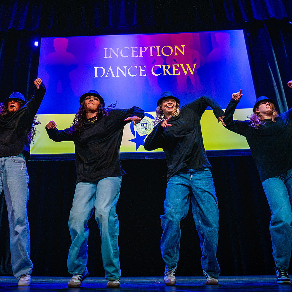 a group of dancers onstage