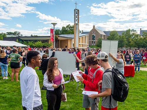 college students gathered at an involvement fair
