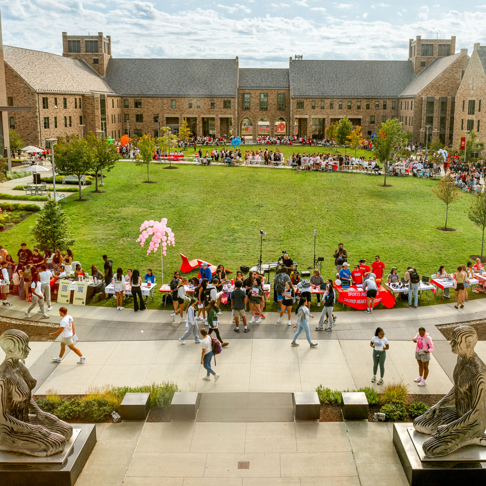 Students outside at the Just SHU It fair
