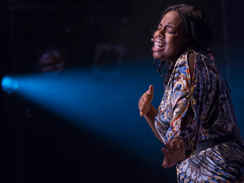 Student performing in the spotlight