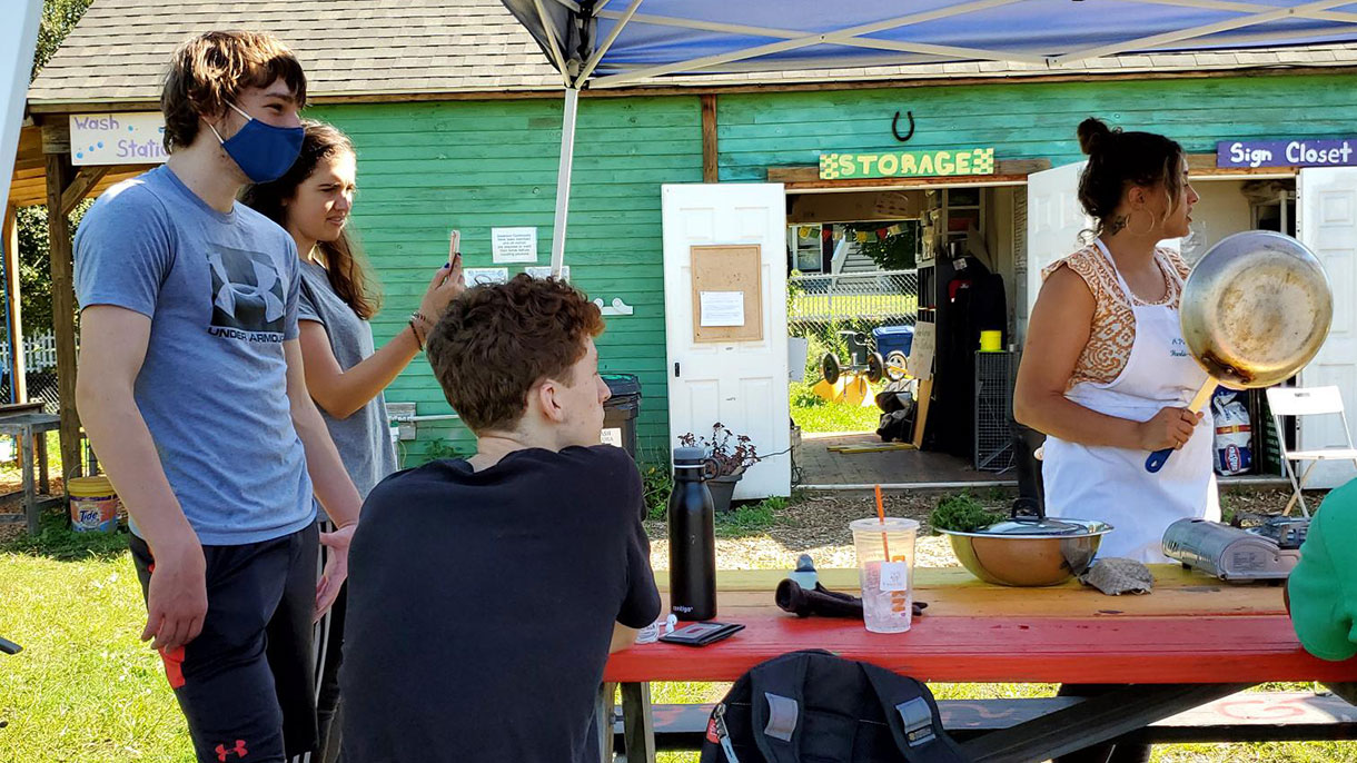SHU-WELL students volunteer at the Reservoir Community Farm in Bridgeport.
