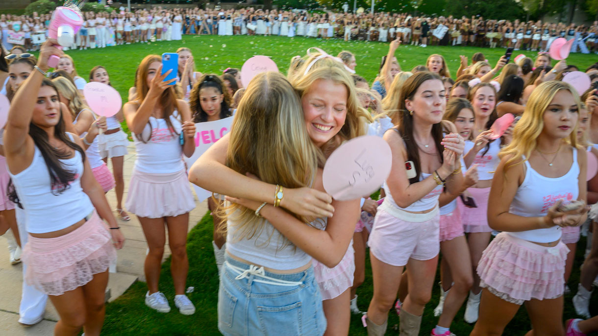 Students hugging at sorority bid