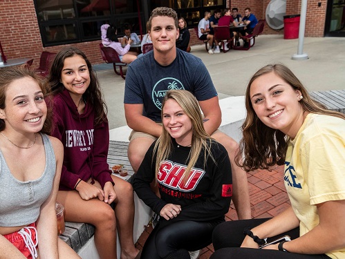 students outside dorm