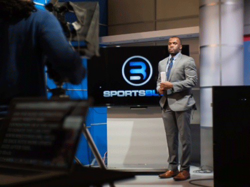 Broadcaster being filmed