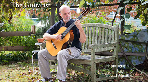The guitarist - man playing the guitar