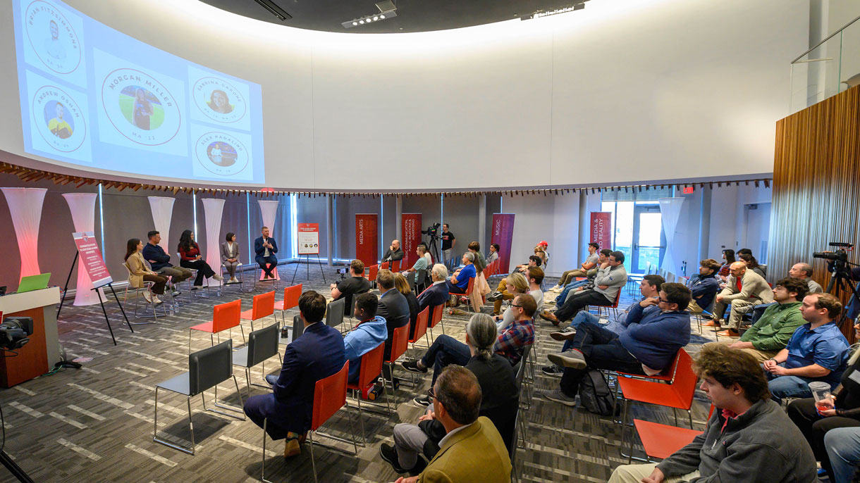 Attendees listening to speakers