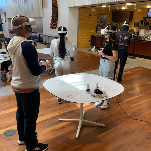 Students using VR in Martire Atrium