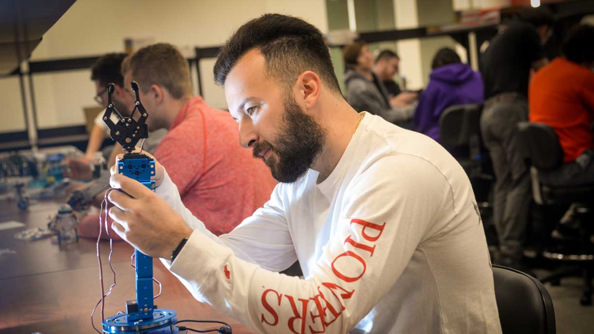 Student working on robot