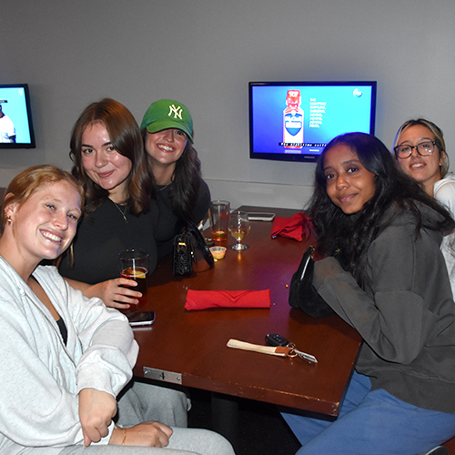 group of five people at a table