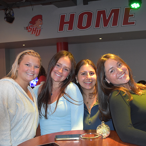 four friends smiling